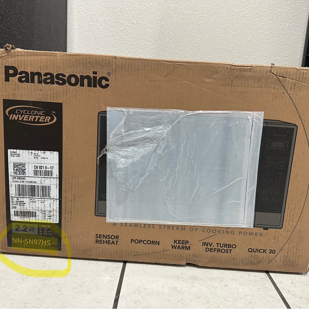 Panasonic Cyclonic Inverter Microwave in Black and Silver